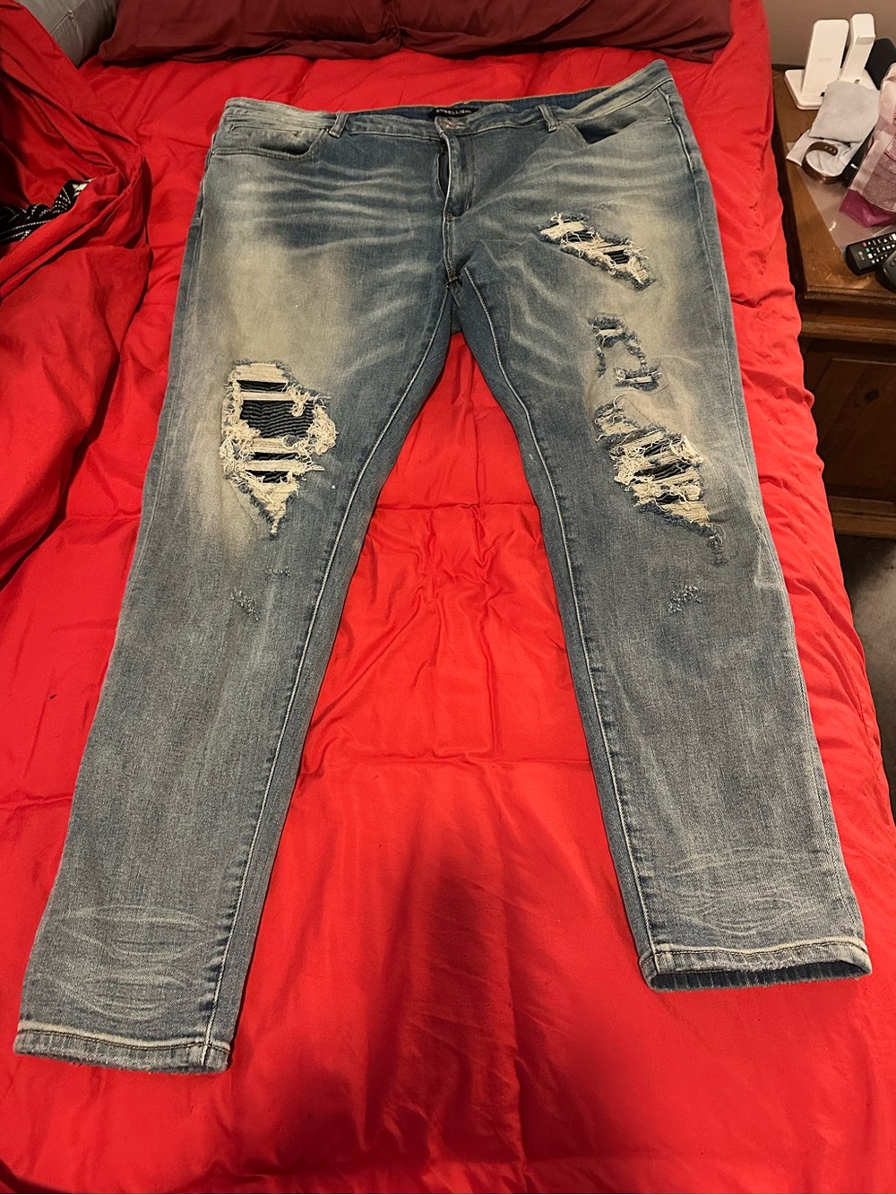 Distressed Light Blue Men’s Ripped Jeans